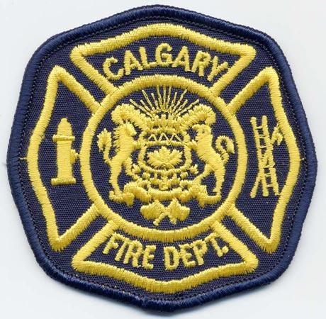 Calgary - Distintivo blu con diciture gialle