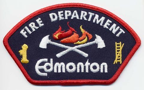 Edmonton - Distintivo blu con al centro fiamme