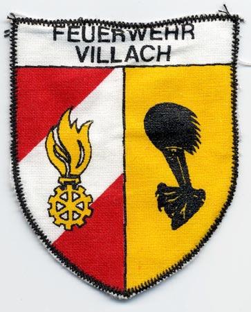 Villach - Distintivo giallo rosso e bianco con fiamme