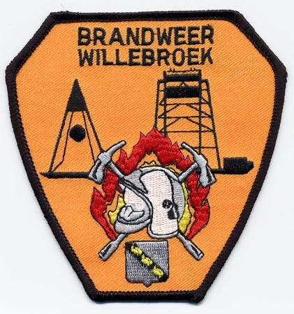 Willebroek - Distintivo arancio con al centro un elmo su sfondo di fiamme