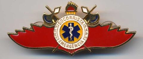 Brasil - Spilla in metallo con al centro croce medica su sfondo giallo
