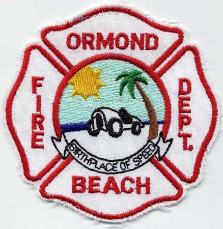 Ormond - Distintivo bianco con al centro una spiaggia