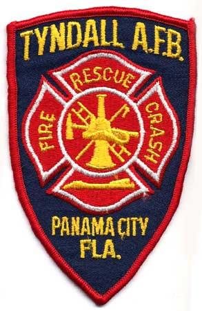 Panama City - Distintivo blu con al centro un elmo giallo