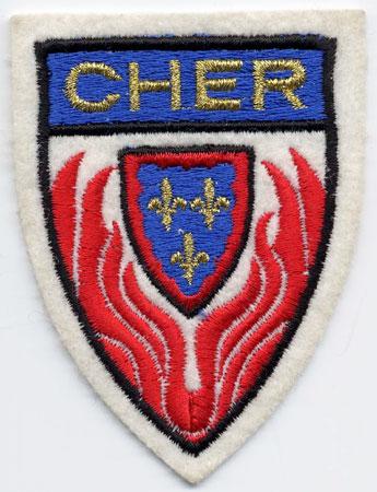 Cher - Distintivo bianco e blu con al centro fiamme