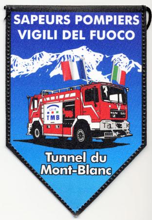 Tunnel Du Mont-Blanc - Distintivo azzurro con al centro mezzo antincendio