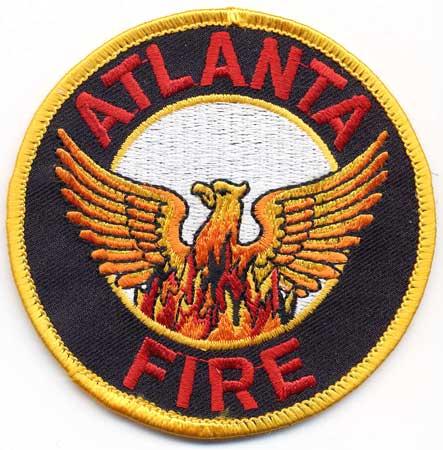 Atlanta - Distintivo nero con al centro un uccello su sfondo di fiamme