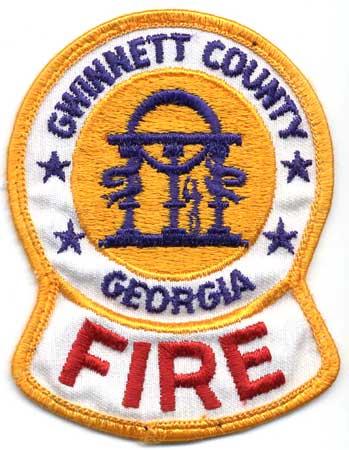 Gwinnett County - Distintivo bianco con diciture blu