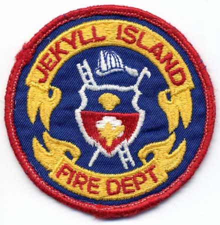 Jekyll Island - Distintivo blu con diciture rosse