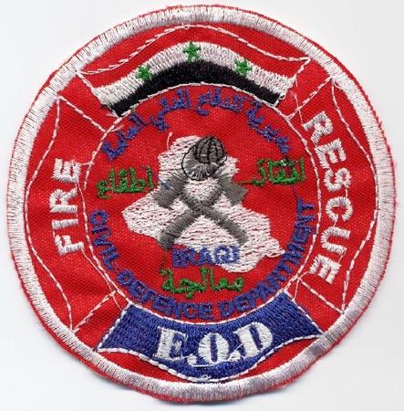 Iraqi - Distintivo rosso con diciture bianche