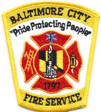 Baltimore City - Distintivo bianco e giallo con diciture nere