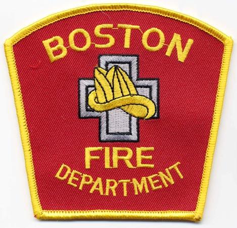Boston - Distintivo rosso con al centro un elmo giallo