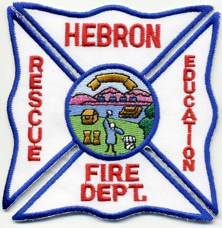 Hebron - Distintivo bianco con diciture rosse