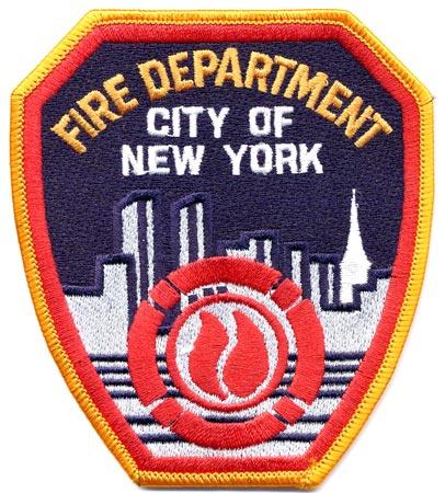 New York - Distintivo blu con al centro una città