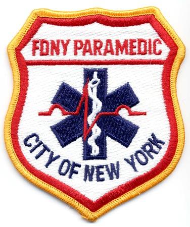 New York - Distintivo bianco con al centro la croce blu medica