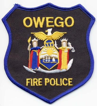Owego - Distintivo blu con diciture gialle