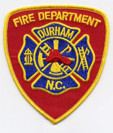 Durham - Distintivo rosso con al centro un elmo rosso su sfondo blu