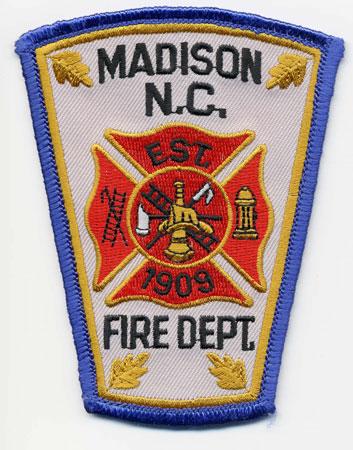 Madison - Distintivo bianco con diciture rosse