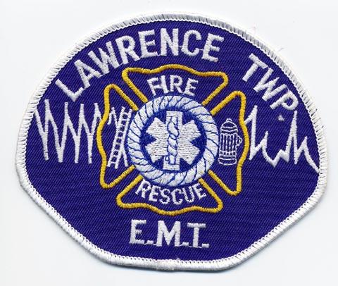 Lawrence - Distintivo blu con al centro la croce medica bianca