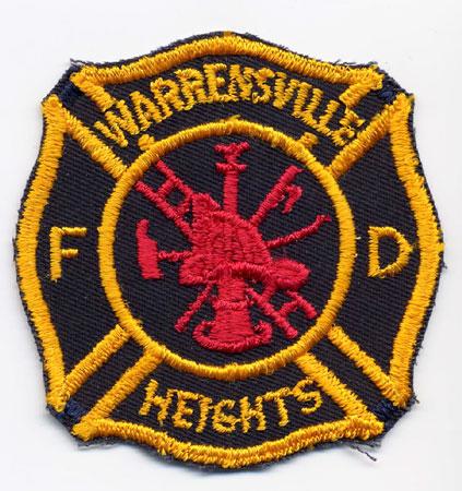 Warrensville Heights - Distintivo nero con al centro un elmo rosso