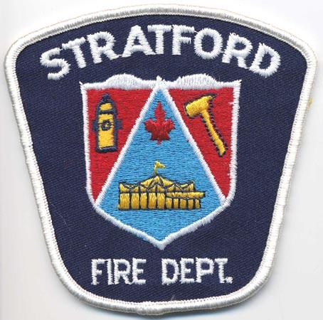 Stratford - Distintivo blu con al centro uno scudo rosso e azzurro