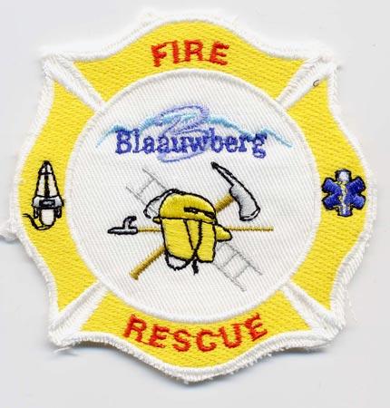 Blaauwberg - Distintivo bianco e giallo con al centro un elmo e una scala