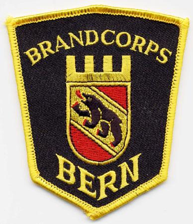 Bern - Distintivo nero con diciture gialle