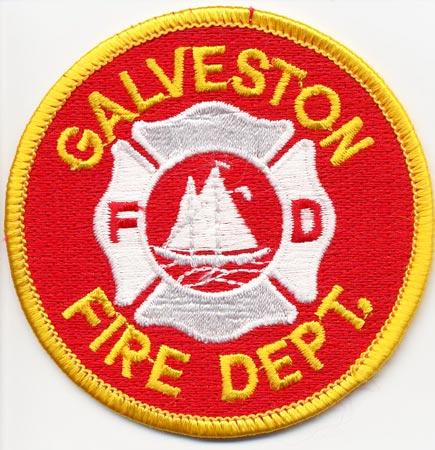 Galveston - Distintivo rosso con al centro una barca bianca