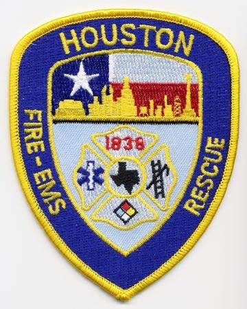 Houston - Distintivo blu con diciture gialle