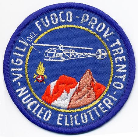 Trento - Distintivo azzurro con al centro monti e un elicottero