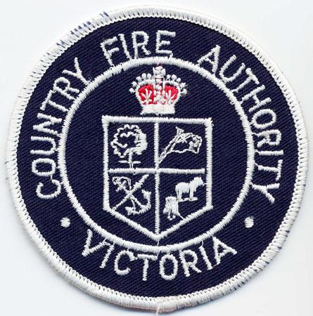 Victoria - Distintivo blu con al centro una corona