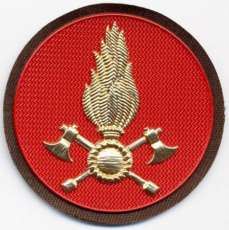 Capo Squadra (Da Cappello) - Distintivo rotondo rosso con al centro fiamma dorata
