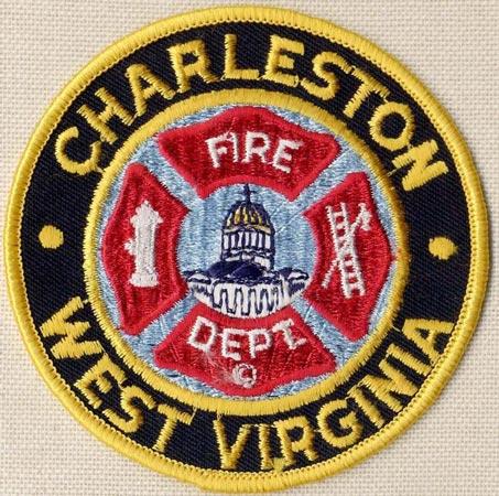 Charleston - Distintivo nero rosso e azzurro con diciture gialle